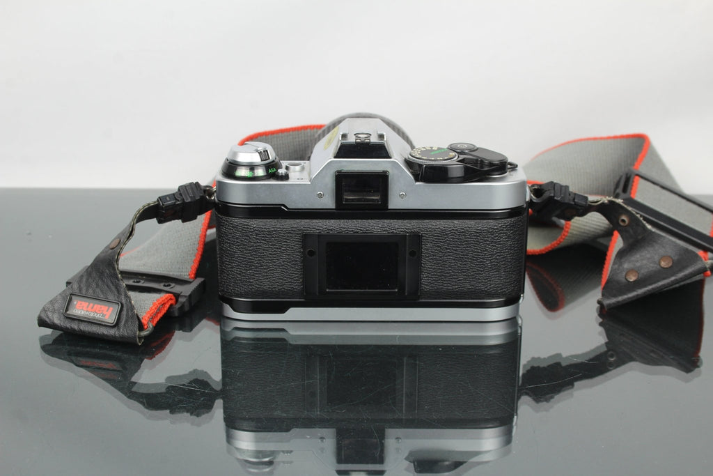 Canon AE - 1 Program + Tokina AT - X 28 - 85mm Canon FD mount lens - Dutch|Thrift