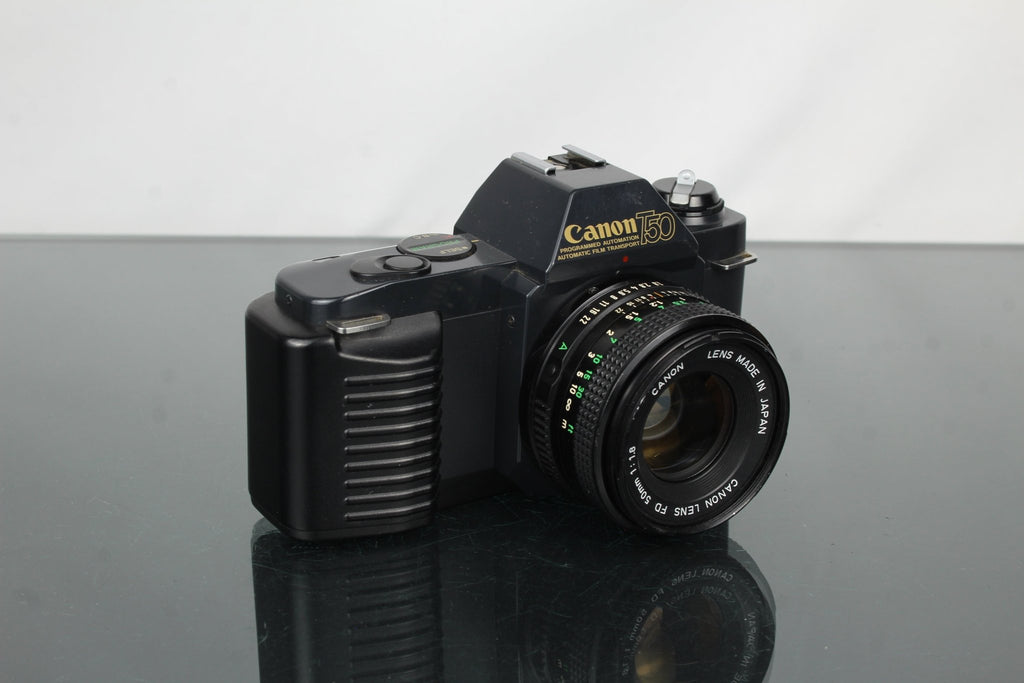 Canon T50 + 50mm 1.8 Canon FD lens - Dutch|Thrift