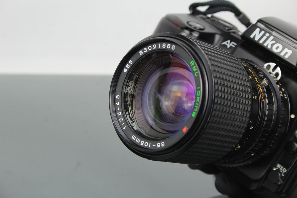 Nikon F - 601 AF + RMC Tokina 35 - 105mm 3.5 - 4.3 lens - Dutch|Thrift